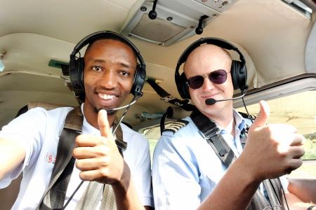 Pilot Peter Griffin and Godfrey Maro