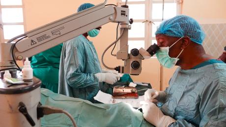 Dr Erick performing eye surgery